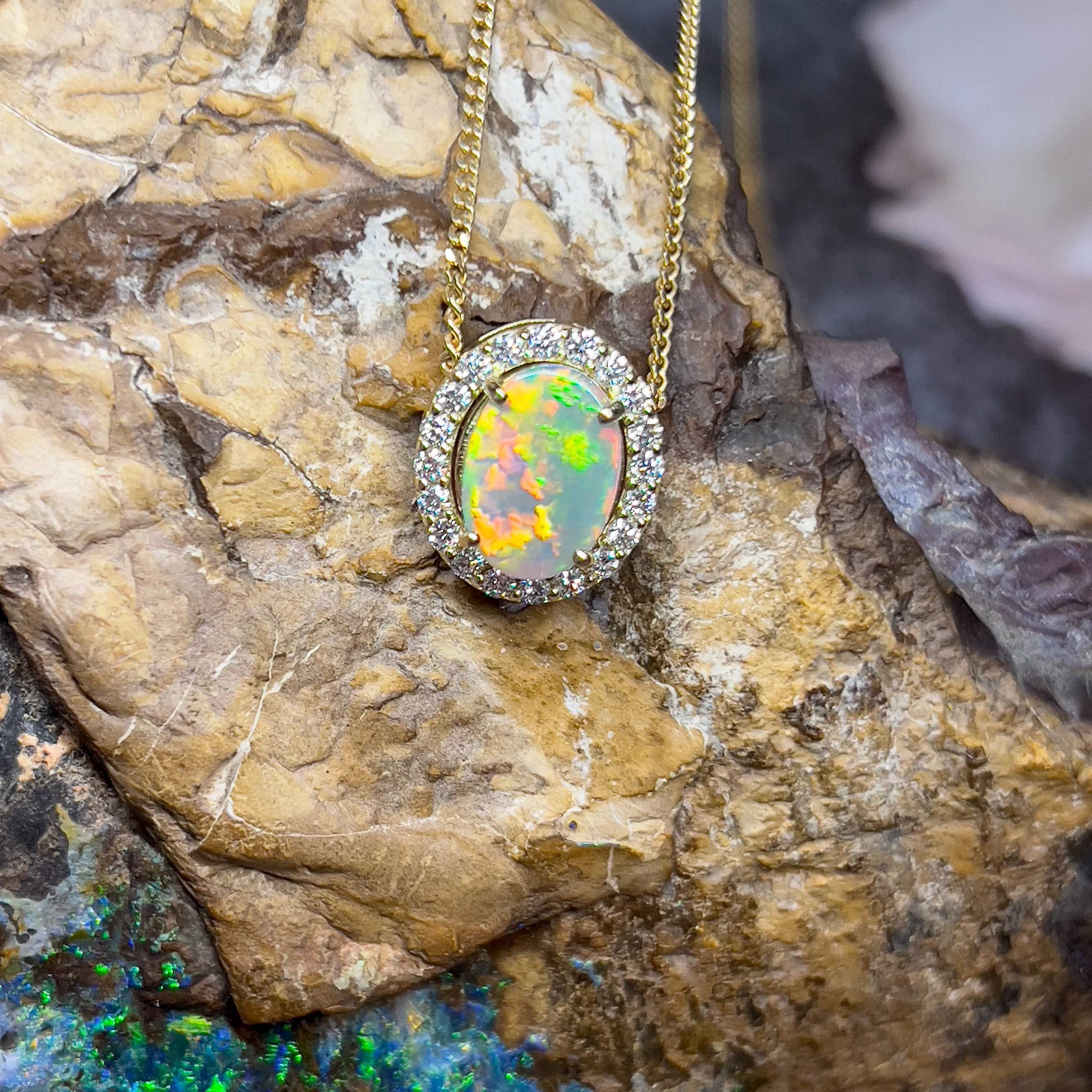 18kt Yellow Gold halo slider pendant with 2ct Opal and diamonds 0.43ct