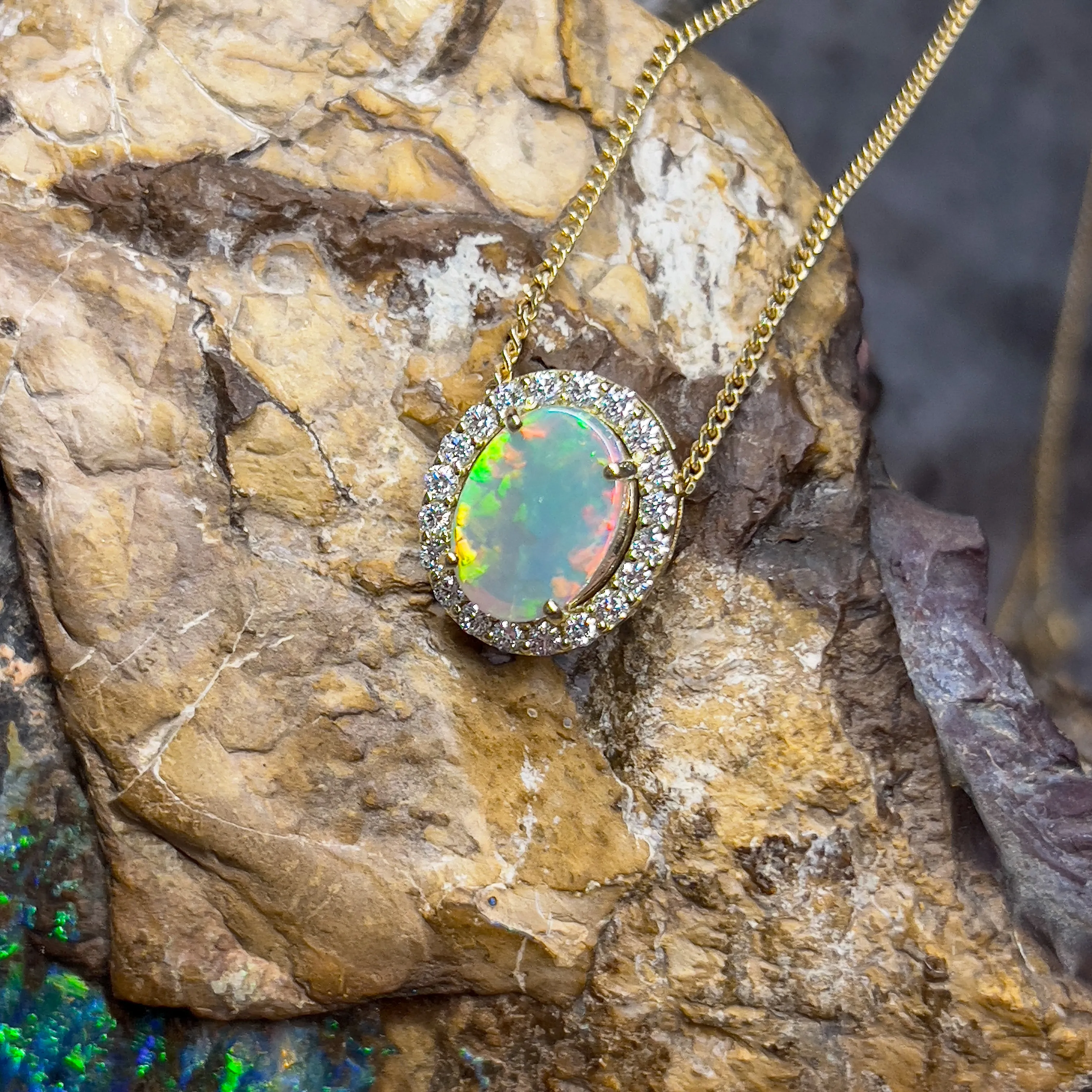 18kt Yellow Gold halo slider pendant with 2ct Opal and diamonds 0.43ct