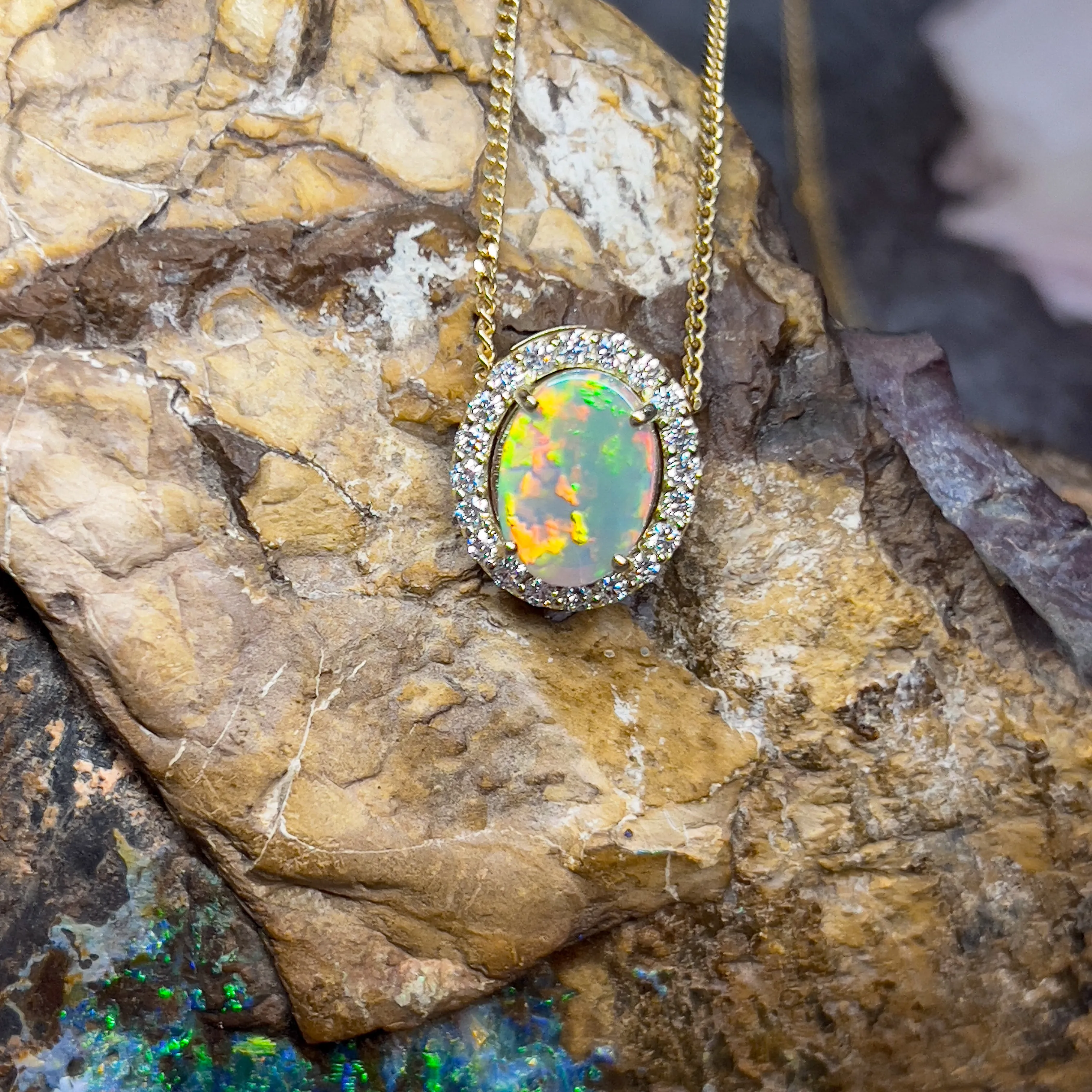 18kt Yellow Gold halo slider pendant with 2ct Opal and diamonds 0.43ct