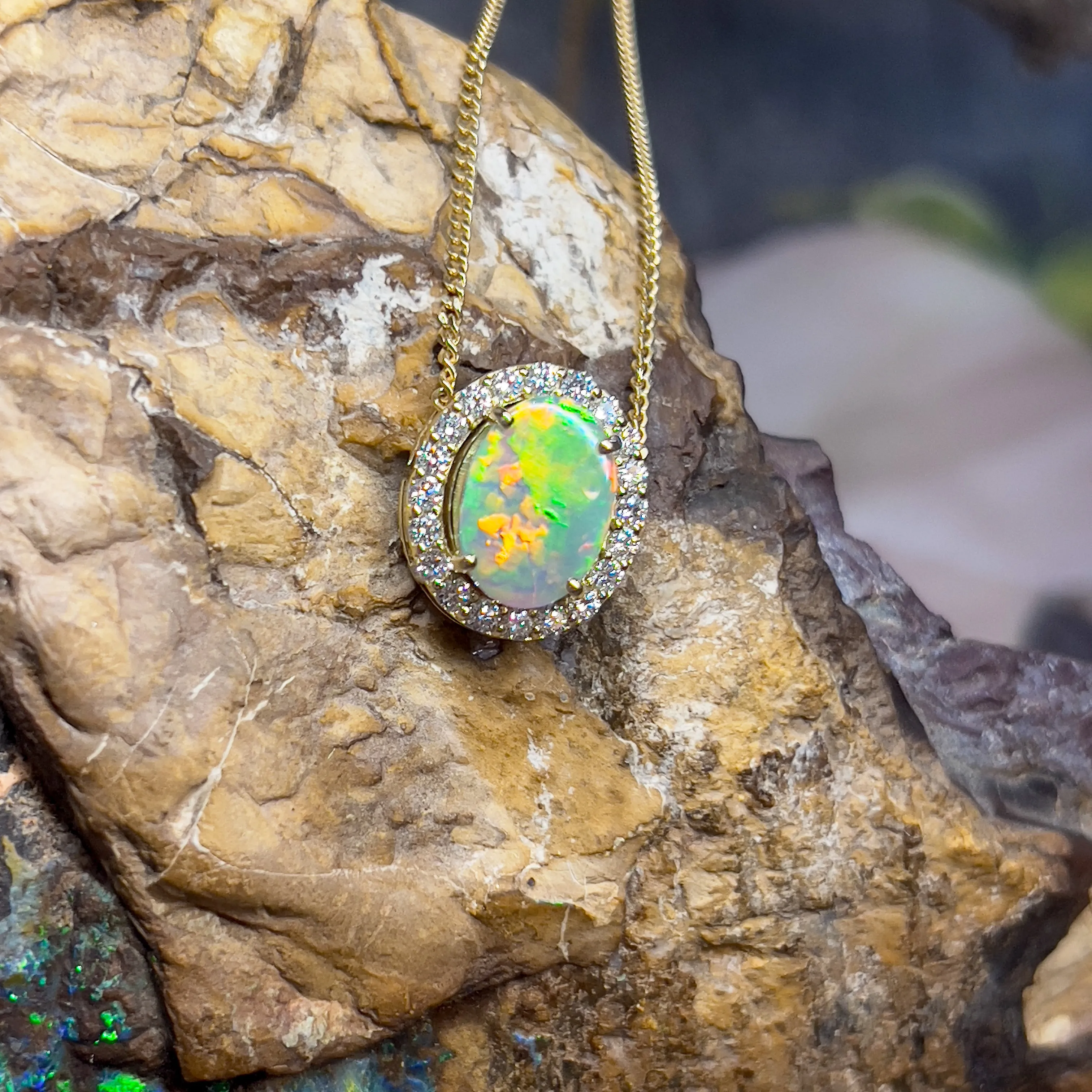 18kt Yellow Gold halo slider pendant with 2ct Opal and diamonds 0.43ct