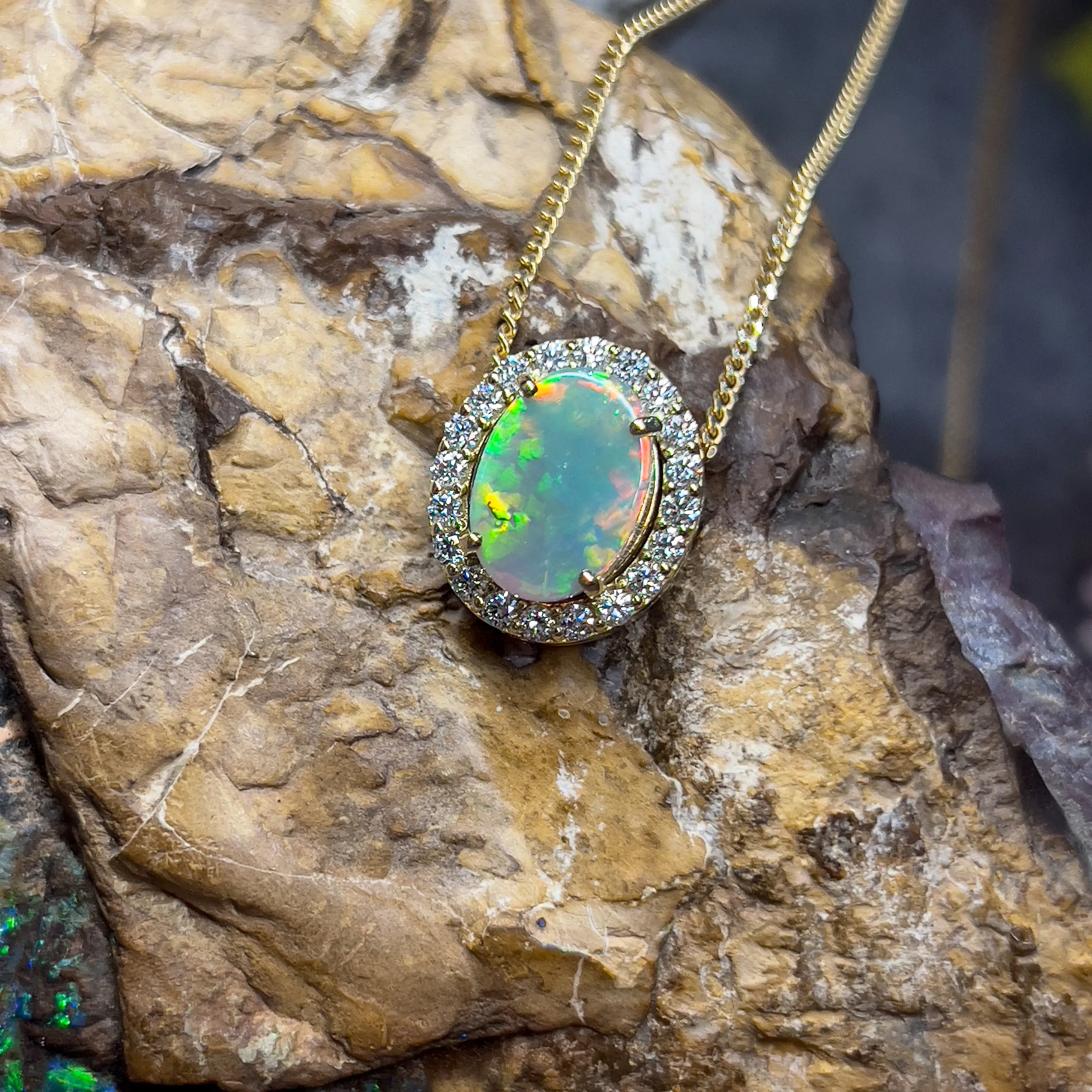 18kt Yellow Gold halo slider pendant with 2ct Opal and diamonds 0.43ct